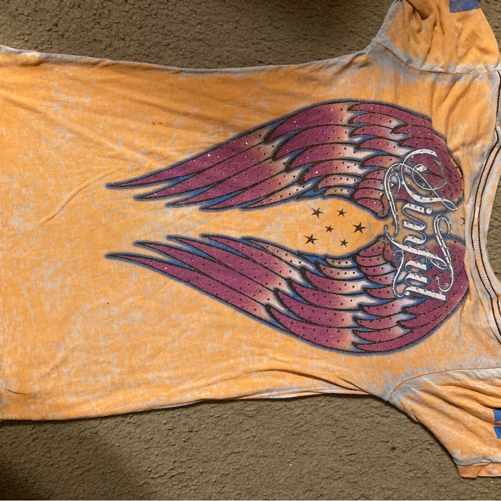 Orange Graphic Tee with Wing Design